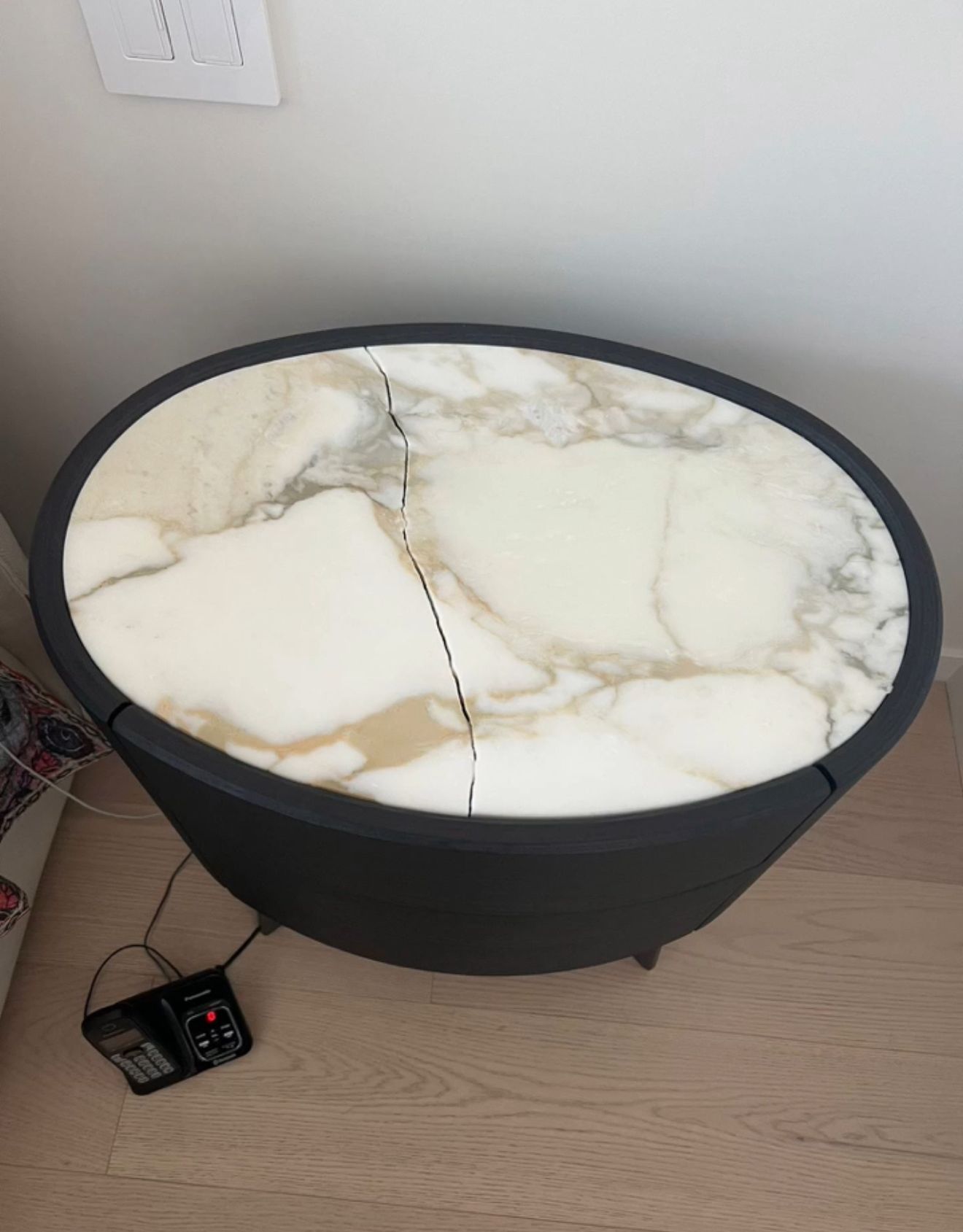 Damaged stone surface before repair